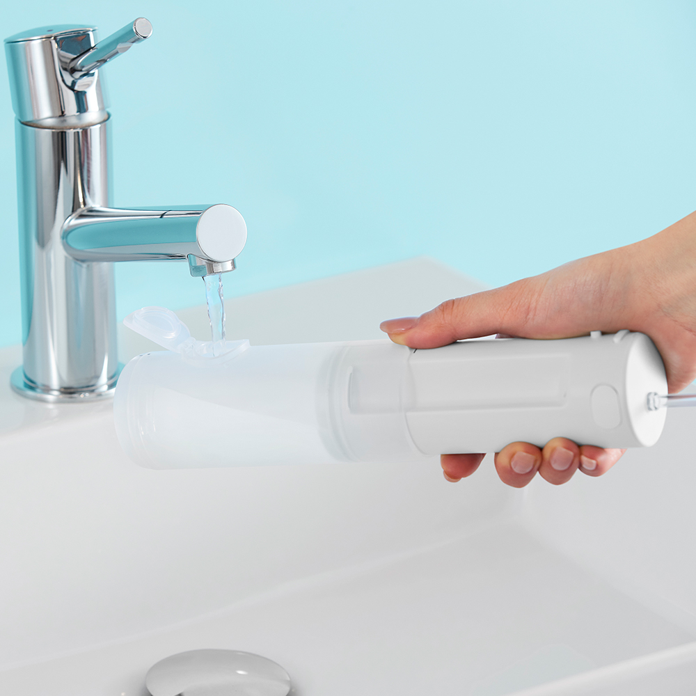 Panasonic EW-DJ4B-W520 Oral Irrigator + Gift (Cleaning Solution)